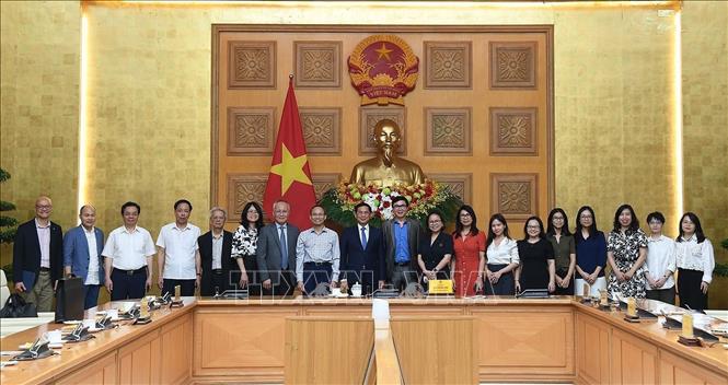 Deputy Prime Minister Bui Thanh Son and delegates at the reception. VNA Photo/Photo by courtesy