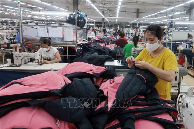 Công ty may TNG Thái Nguyên mỗi năm đạt doanh thu hàng ngàn tỷ đồng, tạo việc làm cho hơn 20.000 lao động. Ảnh: Trần Việt - TTXVN