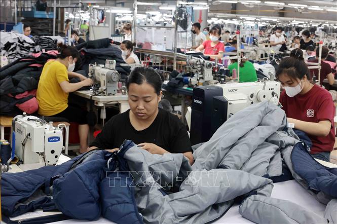 Công ty may TNG Thái Nguyên mỗi năm đạt doanh thu hàng ngàn tỷ đồng, tạo việc làm cho hơn 20.000 lao động. Ảnh: Trần Việt - TTXVN