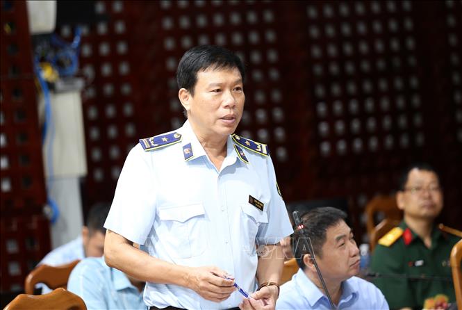 Phó Cục trưởng Cục Nghiệp vụ Quản lý thị trường Trần Văn Dũng phát biểu tại buổi làm việc. Ảnh: Giang Phương – TTXVN