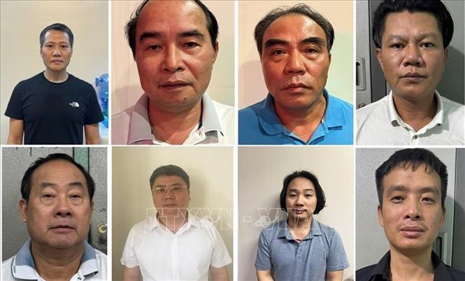 Các đối tượng từ trái qua phải: Bùi Thanh Bình, Nguyễn Văn Bình, Ngô Tiến Cương, Nguyễn Duy Nghiệp, Nguyễn Xuân Tốt, Nguyễn Văn Đức, Lê Xuân Định, Nguyễn Trường Giang.  Ảnh: TTXVN phát