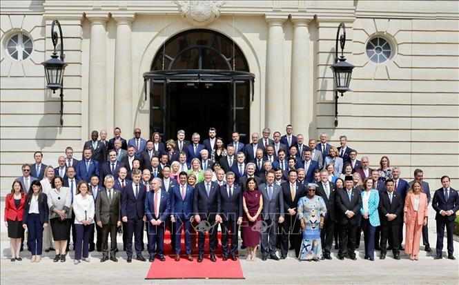Đại biểu các nước tham dự Hội nghị Hội đồng Bộ trưởng OECD 2025. Ảnh: TTXVN phát