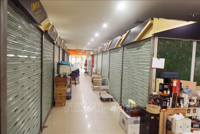 Nhiều kiot tại chợ Hàng Da đóng cửa giữa đợt cao điểm chống hàng giả. Ảnh: Thành Phương – TTXVN