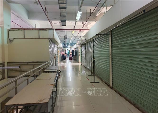Nhiều gian hàng tại Chợ trung tâm thành phố Buôn Ma Thuột đóng cửa trong chiều 5/6/2025. Ảnh: Tuấn Anh - TTXVN