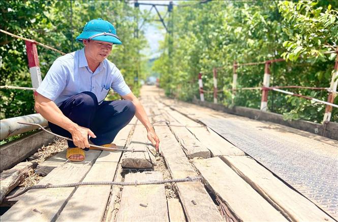 Tình trạng xuống cấp, hư hỏng của cầu treo dân sinh Tung Ke bắc qua sông Ayun (xã Ayun, huyện Chư Sê, tỉnh Gia Lai). Ảnh: Hoài Nam - TTXVN