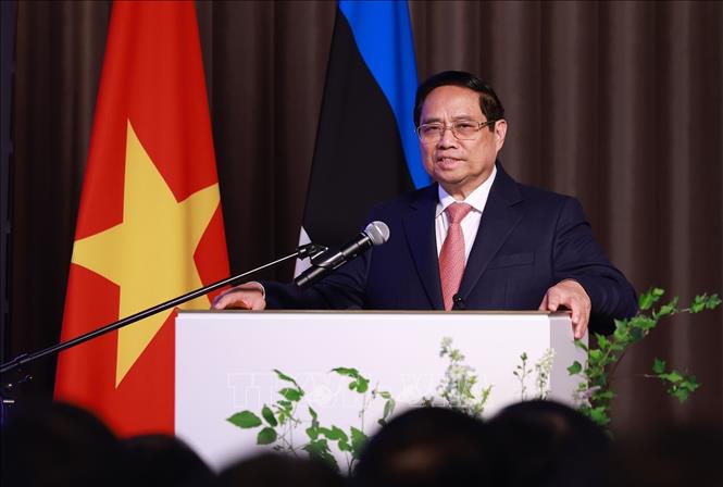 Thủ tướng Phạm Minh Chính phát biểu tại Diễn đàn doanh nghiệp Việt Nam - Estonia. Ảnh: Dương Giang-TTXVN