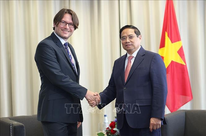 Thủ tướng Phạm Minh Chính tiếp ông Jevgeni Kabanov, Chủ tịch Tập đoàn Bolt - tập đoàn công nghệ chuyên về di chuyển và giao hàng tiêu biểu của Estonia. Ảnh: Dương Giang-TTXVN 

