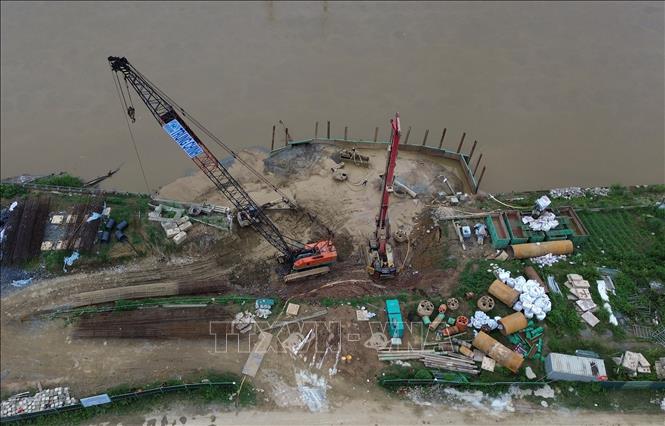 Triển khai thi công khoan nhồi trụ T8, T9 dưới sông, thuộc xã Bản Vược, huyện Bát Xát, tỉnh Lào Cai. Ảnh: Quốc Khánh - TTXVN