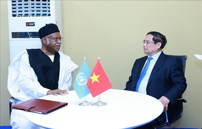 Prime Minister Pham Minh Chinh meets Philemon Yang, President of the 79th session of the UN General Assembly. VNA Photo: Dương Giang