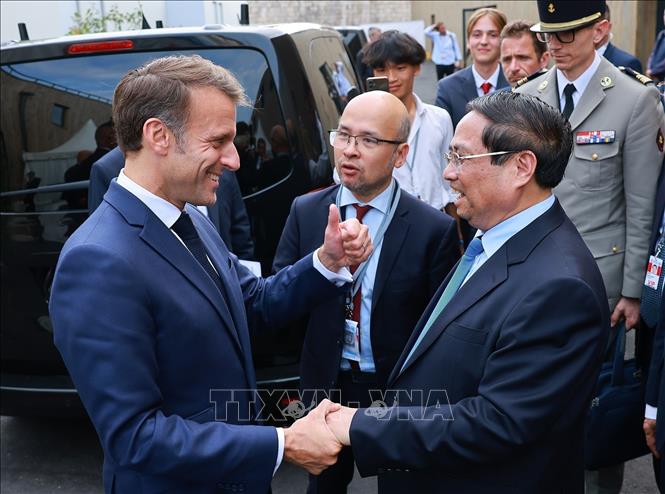 Thủ tướng Phạm Minh Chính hội kiến Tổng thống Pháp Emmanuel Macron. Ảnh: Dương Giang-TTXVN 
