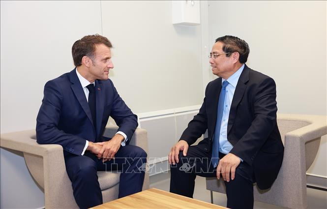 Thủ tướng Phạm Minh Chính hội kiến Tổng thống Pháp Emmanuel Macron. Ảnh: Dương Giang-TTXVN 