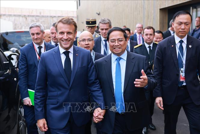 Thủ tướng Phạm Minh Chính hội kiến Tổng thống Pháp Emmanuel Macron. Ảnh: Dương Giang-TTXVN 