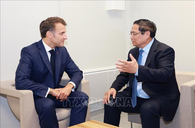 Thủ tướng Phạm Minh Chính hội kiến Tổng thống Pháp Emmanuel Macron. Ảnh: Dương Giang-TTXVN 
