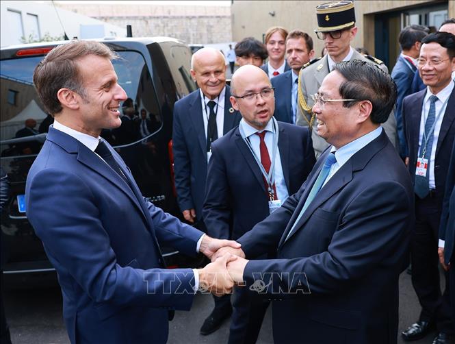 Thủ tướng Phạm Minh Chính hội kiến Tổng thống Pháp Emmanuel Macron. Ảnh: Dương Giang-TTXVN 