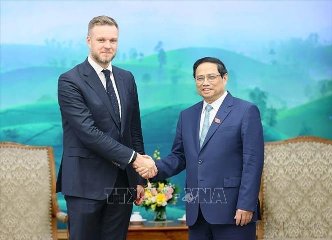 Thủ tướng Phạm Minh Chính tiếp Bộ trưởng Ngoại giao Cộng hòa Lithuania Gabrielius Landsbergis thăm chính thức Việt Nam từ ngày 25 -26/10/2023. Ảnh: Dương Giang-TTXVN