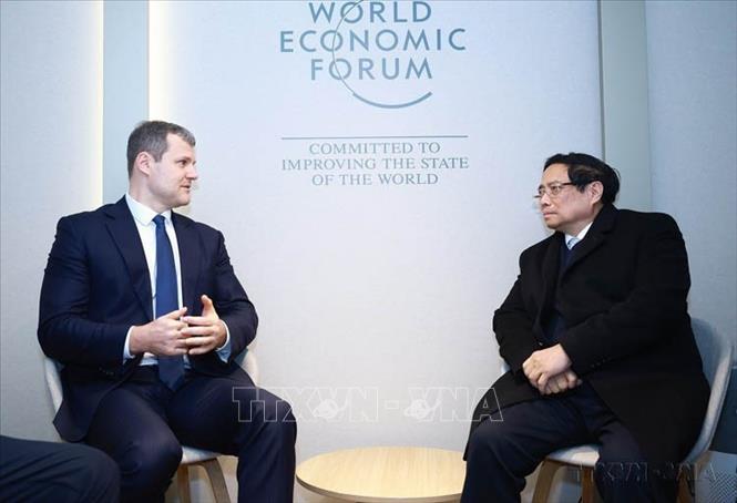  Trong chuyến tham dự Hội nghị thường niên lần thứ 55 Diễn đàn Kinh tế thế giới (WEF) tại Davos (Thụy Sĩ), tối 21/1/2025, Thủ tướng Phạm Minh Chính gặp Thủ tướng Cộng hoà Litva Gintautas Paluckas. Ảnh: Dương Giang-TTXVN