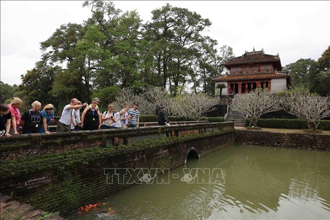 International tourists visit King Minh Mang's Tomb in the central city of Hue. VNA Photo