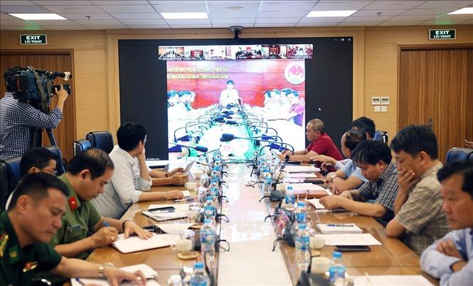 Đầu cầu họp trực tuyến giữa Bộ Nông nghiệp và Môi trường với đầu cầu tỉnh Quảng Nam. Ảnh: Vũ Sinh - TTXVN