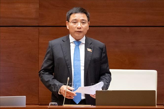 Bộ trưởng Bộ Tài chính Nguyễn Văn Thắng phát biểu giải trình, làm rõ một số vấn đề đại biểu Quốc hội nêu. Ảnh: Doãn Tấn - TTXVN