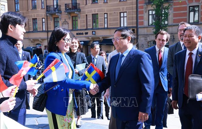Thủ tướng Phạm Minh Chính thăm Đại học Kinh tế Stockholm. Ảnh: Dương Giang-TTXVN
