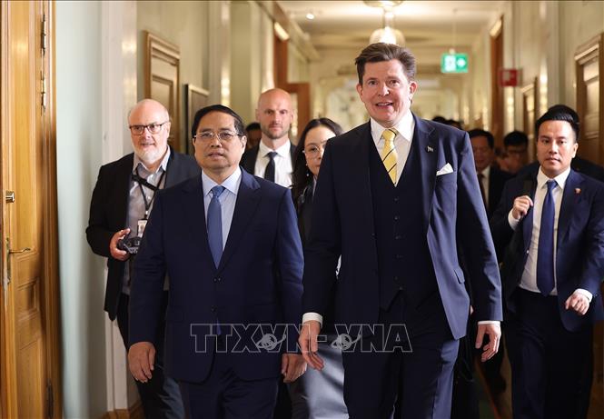 Prime Minister Pham Minh Chinh and Andreas Norlén, Speaker of the Riksdag. VNA Photo: Dương Giang