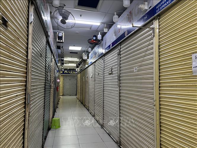 Nhiều gian hàng ở Khu chợ An Đông (Quận 5, TP. Hồ Chí Minh) trong tình trạng đóng cửa. Ảnh: Hứa Chung-TTXVN