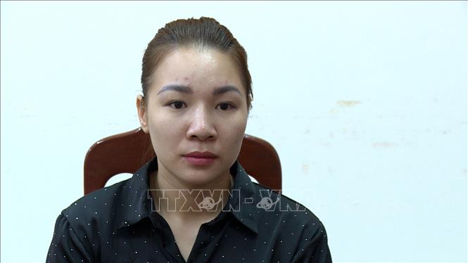 Đối tượng Nguyễn Thị Mai tại cơ quan công an. Ảnh: TTXVN phát