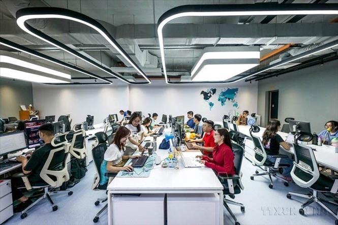 Báo Tuổi Trẻ đưa vào hoạt động tòa soạn chuyển đổi số theo phong cách hiện đại, đa năng và sáng tạo. Đây là cột mốc phát triển mới của báo và nhân kỷ niệm 50 năm hình thành và phát triển Tuổi Trẻ (26/12/2024). Ảnh: TTXVN phát