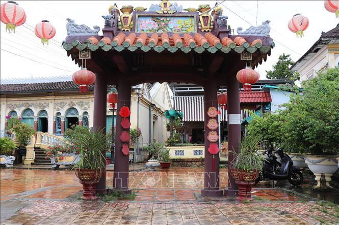 The main gate leading to Binh Thuy ancient house. VNA Photo: Hồng Nhung