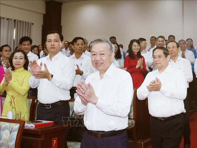 Tổng Bí thư Tô Lâm, Thủ tướng Phạm Minh Chính cùng đoàn công tác Trung ương đến dự buổi làm việc. Ảnh: Thống Nhất – TTXVN

