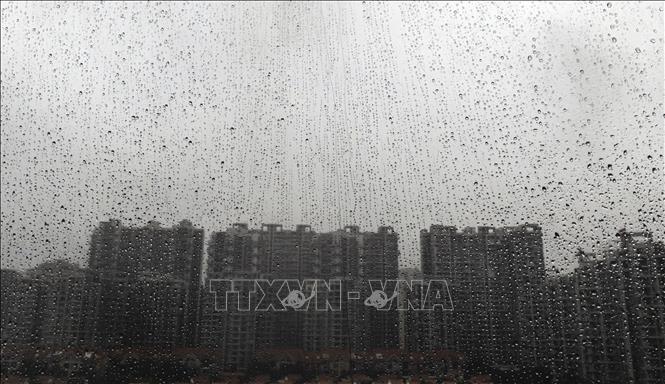 Mưa lớn do ảnh hưởng của bão Wutip tại Khu tự trị dân tộc Choang Quảng Tây, Trung Quốc. Ảnh: THX/TTXVN