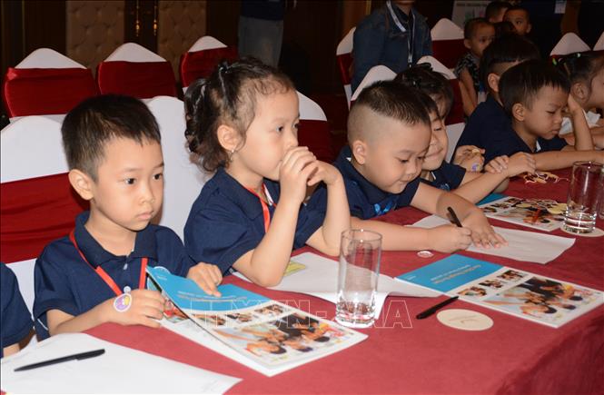 Các em thiếu nhi tham gia hội thảo. Ảnh: Văn Dũng-TTXVN