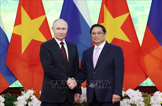Thủ tướng Phạm Minh Chính hội kiến Tổng thống Liên bang Nga Vladimir Putin nhân dịp sang thăm Việt Nam (6/2024). Ảnh: Dương Giang - TTXVN
