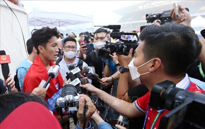 Các phóng viên tác nghiệp tại Đại hội Thể thao Đông Nam Á lần thứ 31 – năm 2021 (SEA Games 31) ở Việt Nam. Ảnh: TTXVN