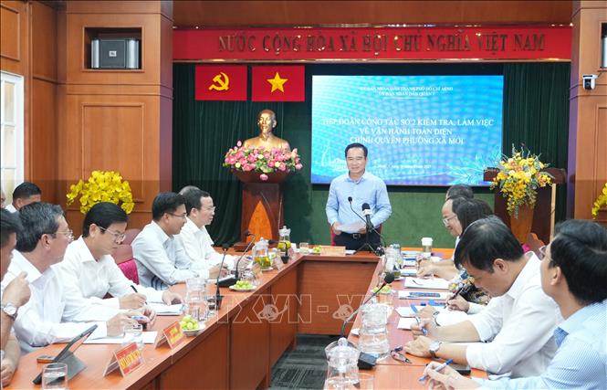 Quang cảnh buổi kiểm tra, làm việc về vận hành toàn diện chính quyền phường, xã. Ảnh: Hữu Duyên - TTXVN 