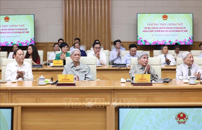 Nguyên lãnh đạo các cơ quan báo chí tham dự buổi gặp. Ảnh: Dương Giang-TTXVN
