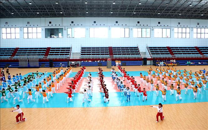 Tiết mục đồng diễn Bài thể dục 9 động tác. Ảnh: Lê Thúy Hằng – TTXVN