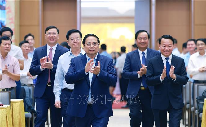Thủ tướng Phạm Minh Chính đến Hội nghị toàn quốc tổng kết Chương trình mục tiêu quốc gia xây dựng nông thôn mới. Ảnh: Dương Giang-TTXVN
