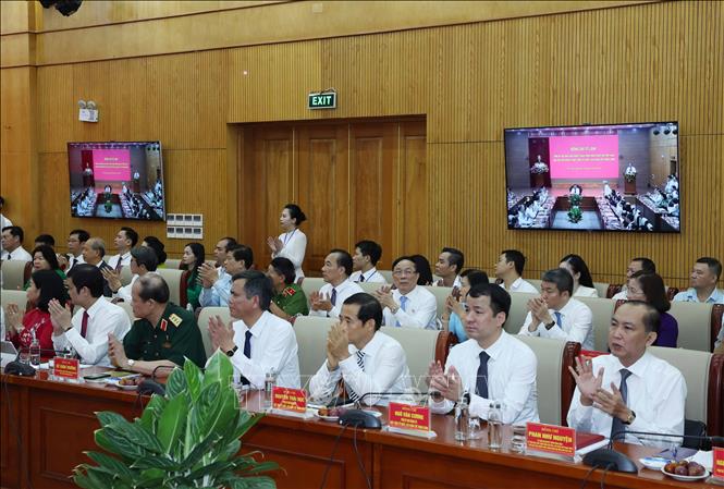 Các đại biểu tham dự buổi làm việc. Ảnh: Thống Nhất – TTXVN