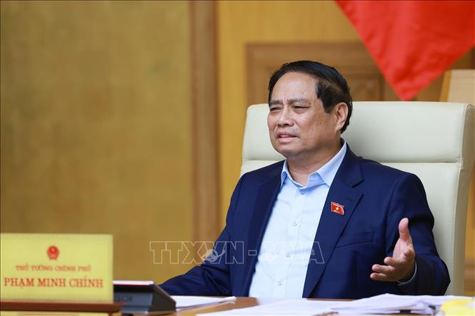 Thủ tướng Phạm Minh Chính chủ trì họp triển khai Triển lãm thành tựu của đất nước nhân dịp kỷ niệm 80 năm Quốc khánh. Ảnh: Dương Giang-TTXVN 
