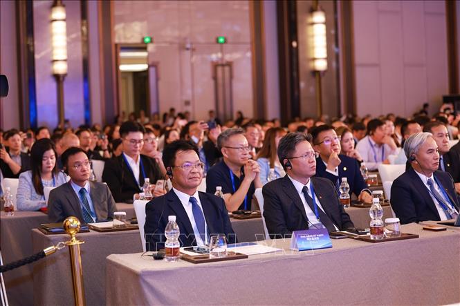 Các đại biểu doanh nghiệp Việt Nam và Trung Quốc tham dự diễn đàn. Ảnh: Dương Giang-TTXVN 