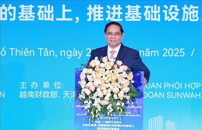 Thủ tướng Phạm Minh Chính phát biểu tại Diễn đàn kết nối doanh nghiệp Việt Nam - Trung Quốc. Ảnh: Dương Giang-TTXVN 
