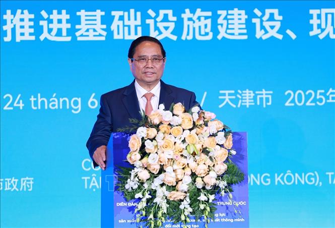 Thủ tướng Phạm Minh Chính phát biểu tại Diễn đàn kết nối doanh nghiệp Việt Nam - Trung Quốc. Ảnh: Dương Giang-TTXVN 
