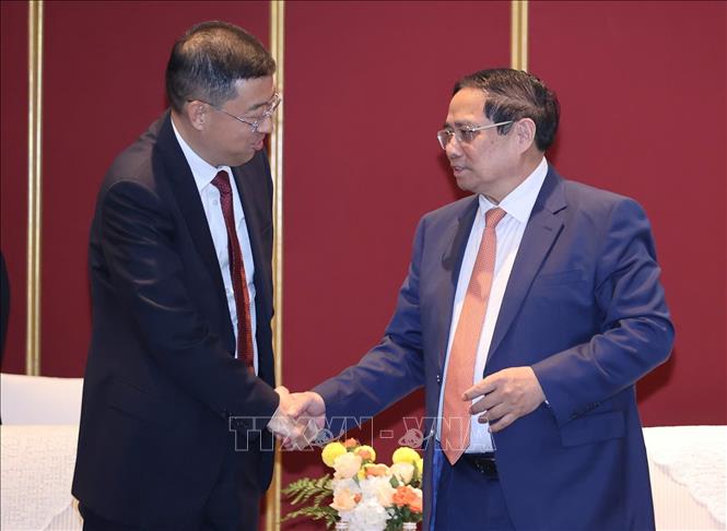Thủ tướng Phạm Minh Chính tiếp lãnh đạo Tập đoàn xây dựng đường sắt Trung Quốc, Binh đoàn 11 và Tổng Công ty công trình đường sắt. Ảnh: Dương Giang-TTXVN 