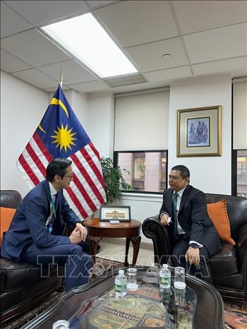 Đại sứ Đỗ Hùng Việt và Đại sứ Malaysia. Ảnh: Thanh Tuấn - Phóng viên TTXVN tại Mỹ