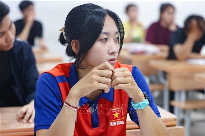 Thí sinh nghe phổ biến quy chế tại điểm thi trường THCS Xuân La (quận Tây Hồ). Ảnh: Thanh Tùng - TTXVN