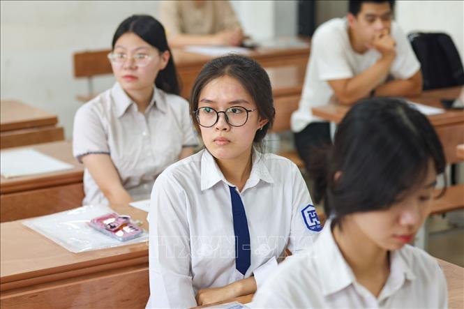 Thí sinh nghe phổ biến quy chế tại điểm thi trường THCS Xuân La (quận Tây Hồ). Ảnh: Thanh Tùng - TTXVN