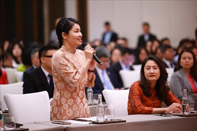 Đại diện cộng đồng người Việt Nam tại Trung Quốc Đỗ Hồng Hạnh phát biểu. Ảnh: Dương Giang-TTXVN