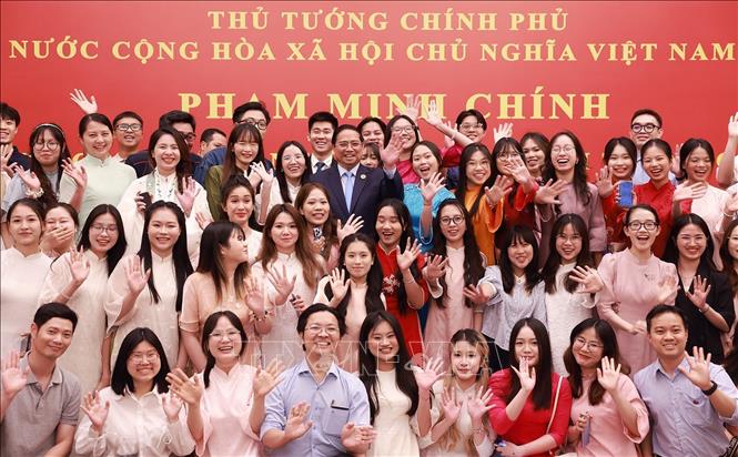 Thủ tướng Phạm Minh Chính với cộng đồng, lưu học sinh Việt Nam tại khu vực Bắc Kinh, Thiên Tân, Hà Bắc. Ảnh: Dương Giang-TTXVN

