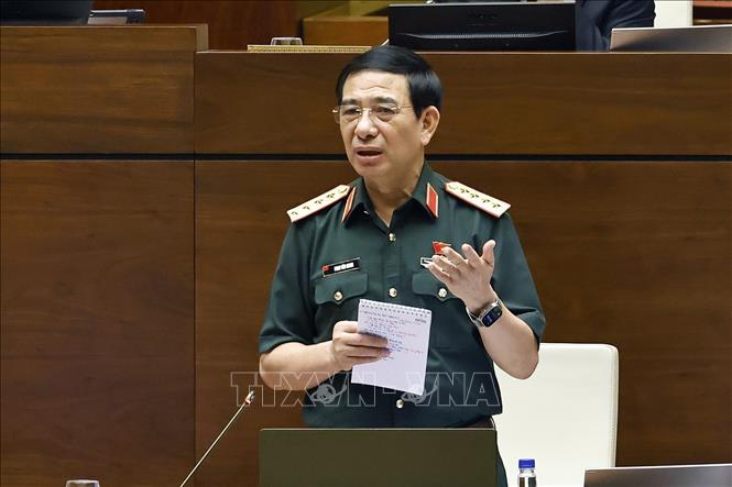 Đại tướng Phan Văn Giang, Bộ trưởng Bộ Quốc phòng phát biểu giải trình, làm rõ một số vấn đề đại biểu Quốc hội nêu. Ảnh: Doãn Tấn - TTXVN